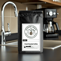 6 Bean Blend dark roast coffee bag on kitchen counter near coffee maker