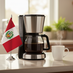 lifestyle picture with a coffee maker on a kitchen counter with a half-filled coffee pot with the Peru flag the left side and a cup of brewed coffee on the other side